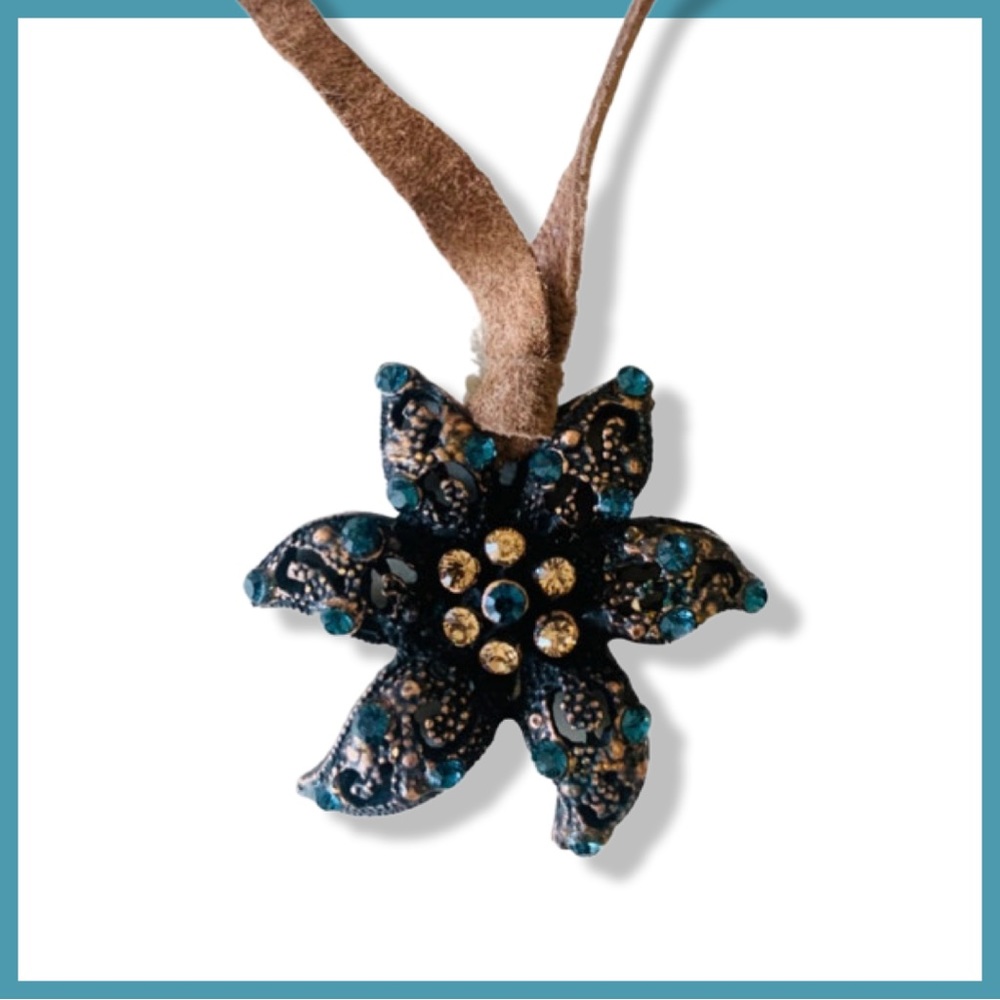 Starfish pendant on a tan suede cord